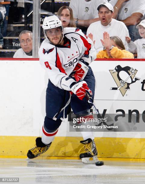 Alex Ovechkin of the Washington Capitals takes a shot against the Pittsburgh Penguins during Game Six of the Eastern Conference Semifinals of the...