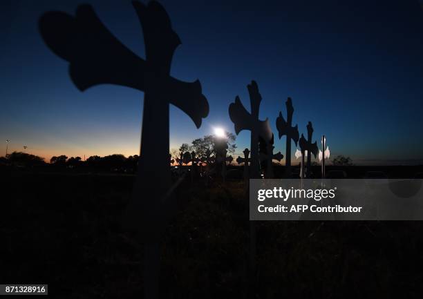 Row of crosses for each victim has been placed at a memorial, after a mass shooting that killed 26 people in Sutherland Springs, Texas on November 6,...