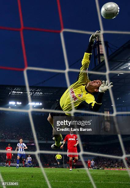 Patrick Ebert of Berlin scores the second goal past goalkeeper Thomas Kessler of Koeln during the Bundesliga match between 1. FC Koeln and Hertha BSC...