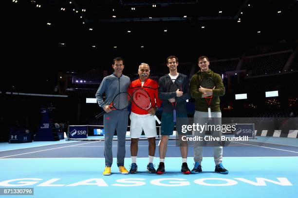 Tim Henman, Mansour Bahrami, Andy Murray and Jamie Murray pose for photos during Andy Murray Live at The Hydro on November 7, 2017 in Glasgow,...