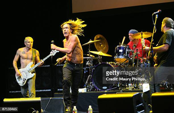 Musicians Flea, Iggy Pop, Chad Smith and Steve Jones perform at the 5th annual MusiCares MAP Fund benefit concert on May 8, 2009 in Los Angeles,...