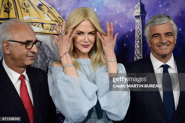 Australian actress Nicole Kidman , President and CEO of Le Printemps Paolo De Cesare and LVMH Group Managing Director Antonio Belloni pose as they...