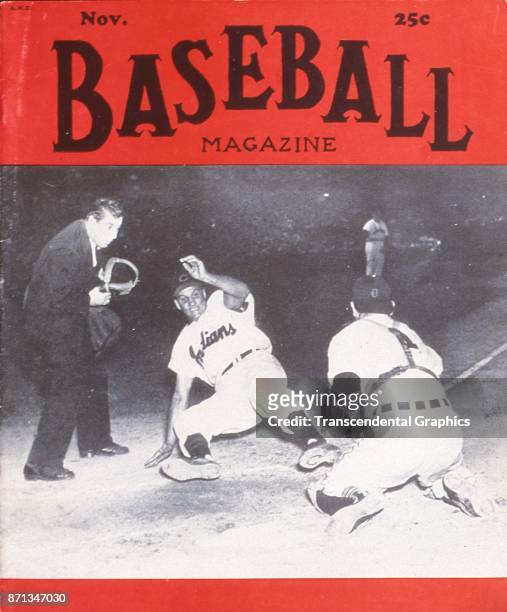 Baseball Magazine features a photograph of on-field action at home plate during a game between the Cleveland Indians and the Detroit Tigers, November...