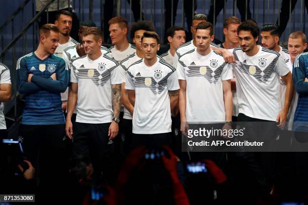 German national football team members goalkeeper Marc-Andre Ter Stegen, midfielder Toni Kroos, midfielder Mesut Ozil, midfielder Julian Draxler and...