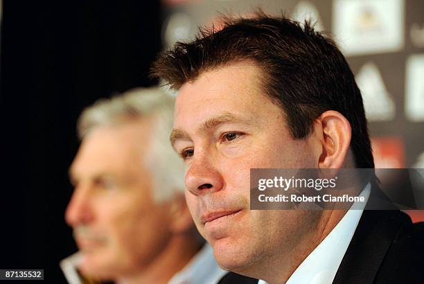 Blues coach Brett Ratten talks to the media as Magpies coach Michael Malthouse listens during a Carlton and Collingwood AFL joint press conference...