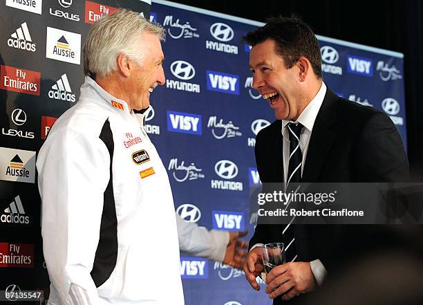 Magpies coach Michael Malthouse and Blues coach Brett Ratten share a joke after a Carlton and Collingwood AFL joint press conference held at ZINC at...