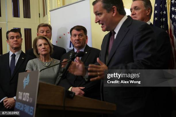 Sen. Ted Cruz speaks as Sen. Todd Young , Sen. Shelley Moore Capito , Sen. Dean Heller , Sen. Michael Rounds and Sen. David Perdue listen during a...