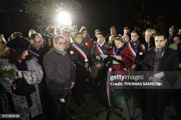 Mayor of Bagneux, Marie-Helene Amiable , gives a speech as people attend a tribute to Ilan Halimi on November 7, 2017 in Bagneux, outside Paris,...