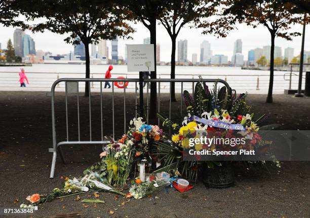 Flowers mark the location where terrorist Sayfullo Saipov crashed into a cyclist along a Manhattan bike path during a rampage with a truck last...