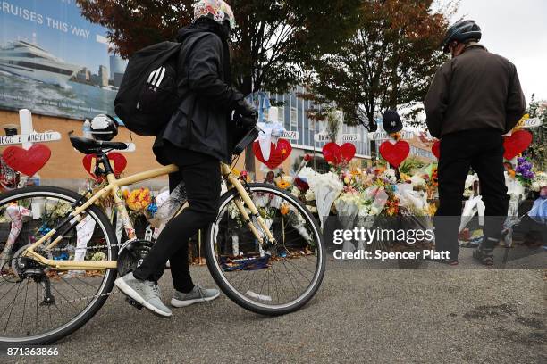 Eight crosses mark the location where terrorist Sayfullo Saipov entered a Manhattan bike path and went on a rampage with a truck last Tuesday...