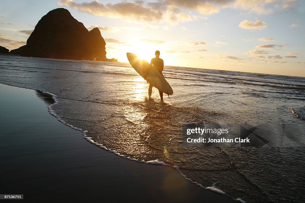 Silhouette man walking on beach