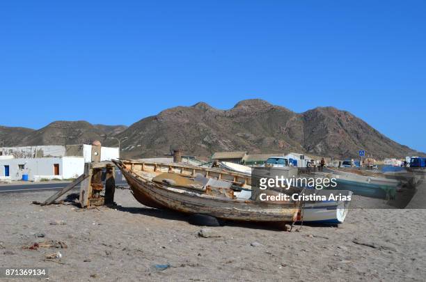 Old fishing boats on the beach close to La Almadraba de Monteleva , small fishing village in Cabo de Gata, in May 2017, Almeria, Andalucia, Spain.