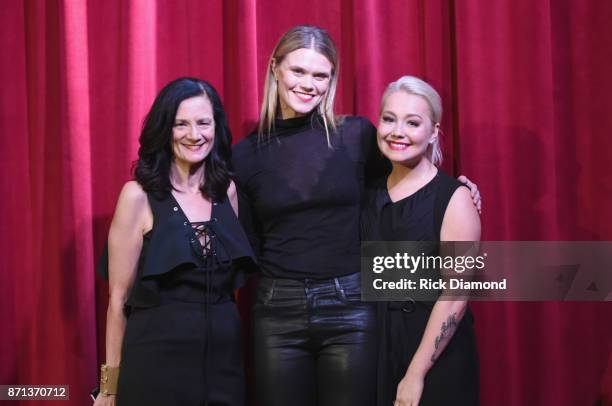 Senior Vice President of Music Strategy for CMT Leslie Fram, songwriter Nicolle Galyon and singer-songwriter Raelynn onstage during the 2017 CMT Next...