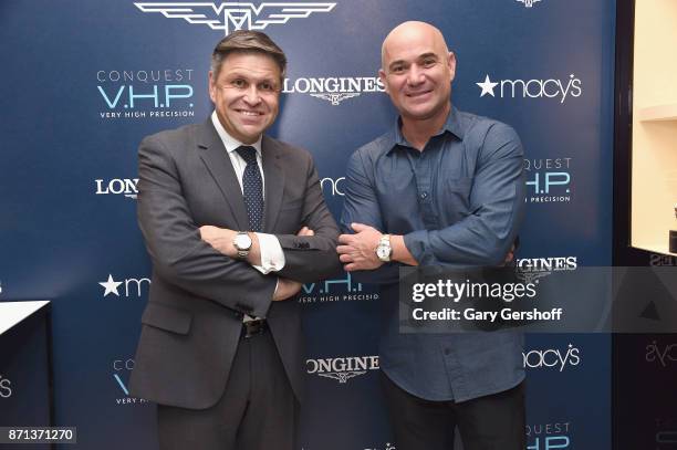 Vice President of Longines and Head of International Marketing, Juan-Carlos Capelli and Andre Agassi attend the launch of Longines Master Collection...