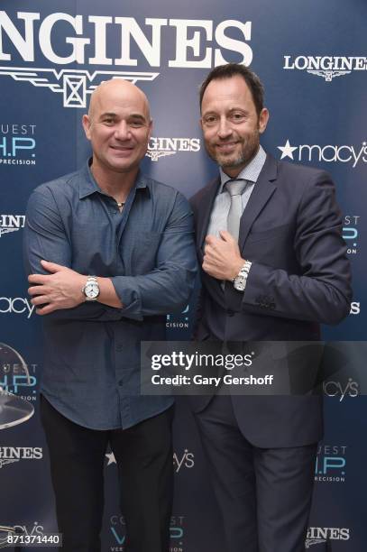 Andre Agassi and President of Longines, United States, Pascal Savoy attend the launch of Longines Master Collection Watch at Macy's Herald Square on...