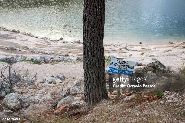 Sport fishing signal is seen on Vilarinho das Furnas with the low water level on November 7, 2017 in Terras de Bouro, Portugal. In 1972 the 2000 year...