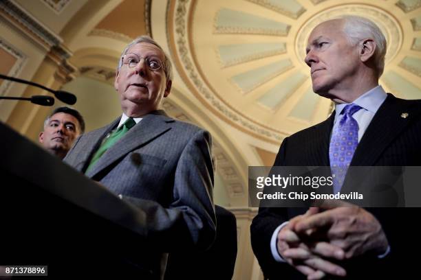 Senate majority Leader Mitch McConnell talks to reporters with Sen. Cory Gardner and Majority Whip John Cornyn following the weekly Republican policy...
