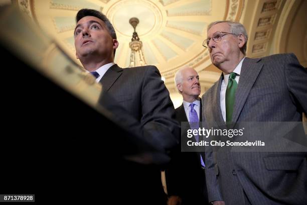 Sen. Cory Gardner , Majority Whip John Cornyn and Senate majority Leader Mitch McConnell talk to reporters with following the weekly Republican...