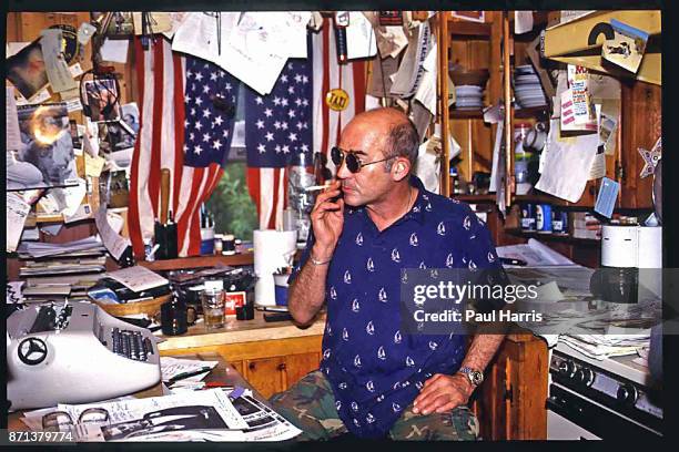 Hunter Thompson aka Hunter S Thompson aka Gonzo Journalist at his ranch sitting in his kitchen which he also used as an office on October 12, 1990 in...