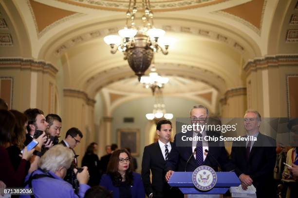 Senate Minority Leader Charles Schumer talks to reporters with Sen. Tammy Duckworth , Sen. Brian Schatz and Sen. Chris Van Hollen following the...