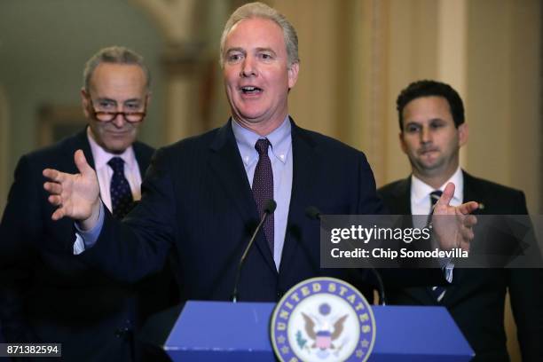 Sen. Chris Van Hollen talks to reporters with Senate Minority Leader Charles Schumer and Sen. Brian Schatz following the weekly Democratic policy...