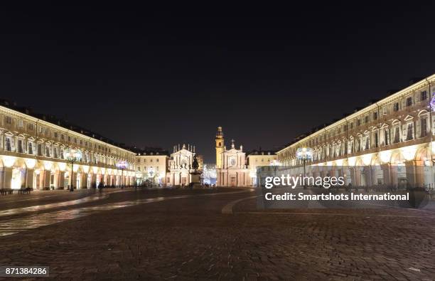 san carlo square illuminated at night in turin, piedmont, italy - turin cathedral stock pictures, royalty-free photos & images