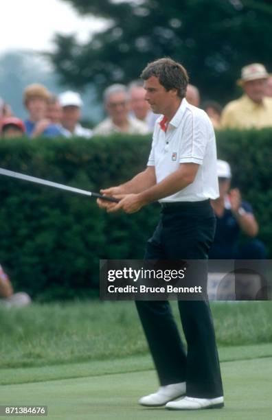 Curtis Strange of the United States walks on the green during the Manufacturers Hanover Westchester Classic circa June, 1982 at the Westchester...