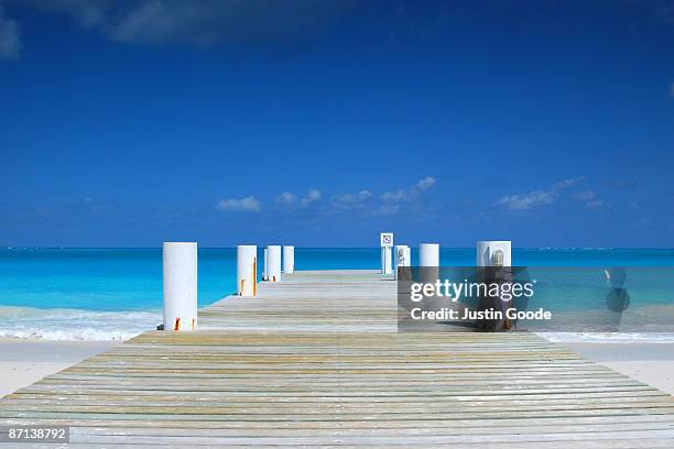 the pier  - turks and caicos islands stock pictures, royalty-free photos & images