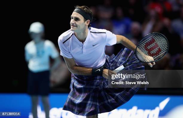 Roger Federer plays a shot whilst wearing a Kilt during his match against Andy Murray during Andy Murray Live at The Hydro on November 7, 2017 in...