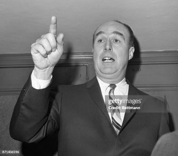 National Basketball Association President Walter Kennedy is shown during hurriedly assembled news conference as the NBA All-Star game was held up as...