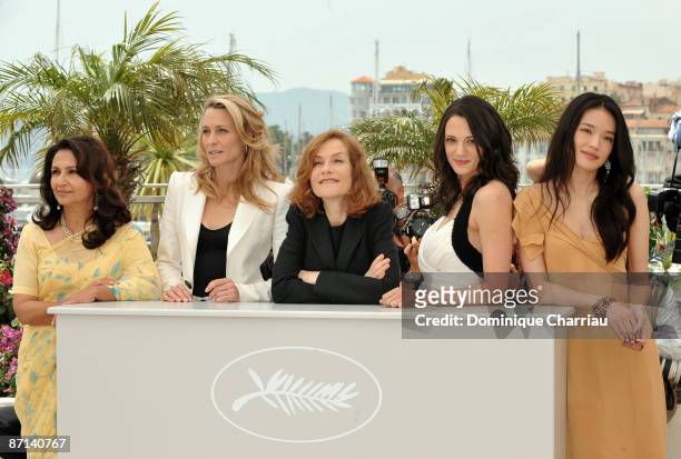 Jury members actresses Sharmila Tagore, Robin Wright Penn, jury president Isabelle Huppert, Asia Argento and Shu Qi attend the Jury Photocall at the...