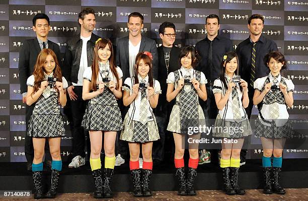 Actors John Cho, Eric Bana, Chris Pine, Director J.J. Abrams, actors Zachary Quinto and Karl Urban pose with Japanese pop group AKB48 during the...