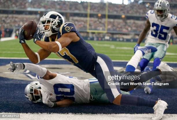 Los Angeles Rams wide receiver Robert Woods just misses a touchdown reception against Dallas Cowboys cornerback Anthony Brown during the first half...