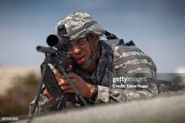 us soldier with a sniper rifle - hitman stock pictures, royalty-free photos & images