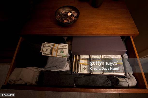 hiding cash within your clothes - change socks stockfoto's en -beelden