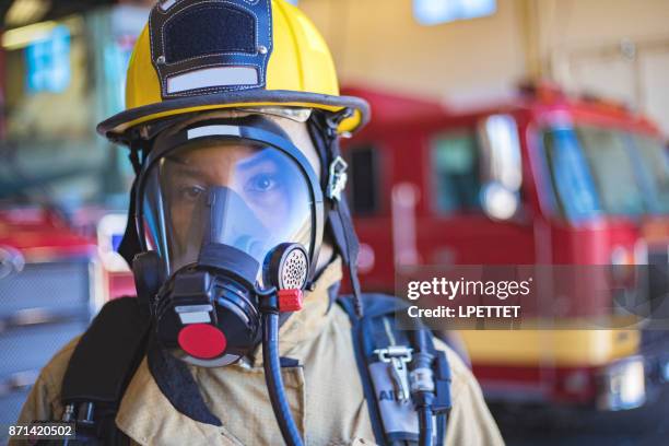 firefighter - oxygen cylinder stock pictures, royalty-free photos & images