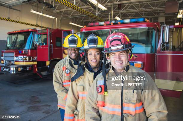 firefighter - firefighter uniform stock pictures, royalty-free photos & images