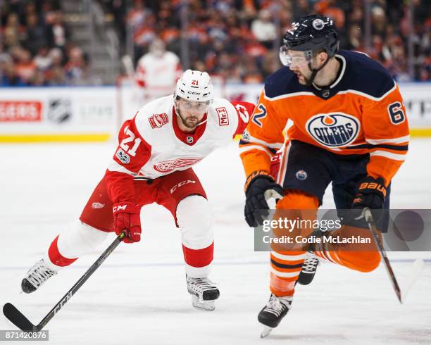 Eric Gryba of the Edmonton Oilers defends against Tomas Tatar of the Detroit Red Wings at Rogers Place on November 5, 2017 in Edmonton, Canada.