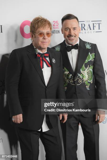 Sir Elton John and David Furnish attend the Elton John AIDS Foundation Commemorates Its 25th Year And Honors Founder Sir Elton John During New York...