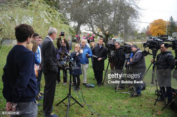 Democratic gubernatorial candidate Phil Murphy holds a news conference with his family after voting on election day November 7, 2017 in Asbury Park,...