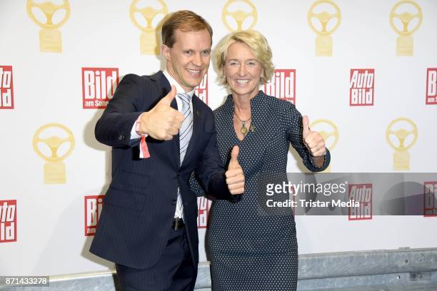 Isolde Holderied and Mattias Ekstroem attend the 'Das Goldene Lenkrad' Award at Axel Springer Haus on November 7, 2017 in Berlin, Germany.