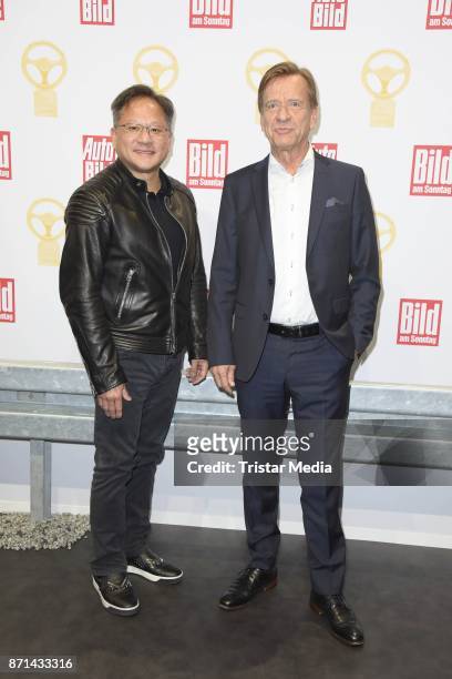 Jensen Huang and Hakan Samuelsson attend the 'Das Goldene Lenkrad' Award at Axel Springer Haus on November 7, 2017 in Berlin, Germany.
