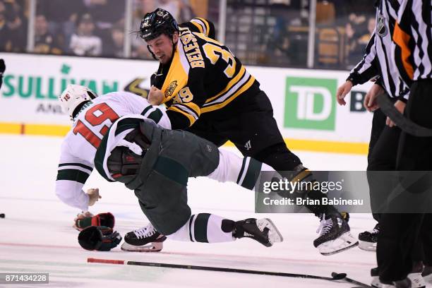 Matt Beleskey of the Boston Bruins fights Luke Kunin of the Minnesota Wild at the TD Garden on November 6, 2017 in Boston, Massachusetts.