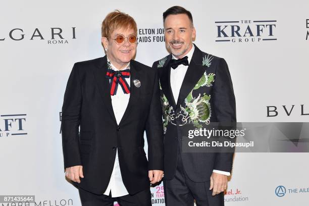 Sir Elton John and David Furnish attend the Elton John AIDS Foundation Commemorates Its 25th Year And Honors Founder Sir Elton John During New York...