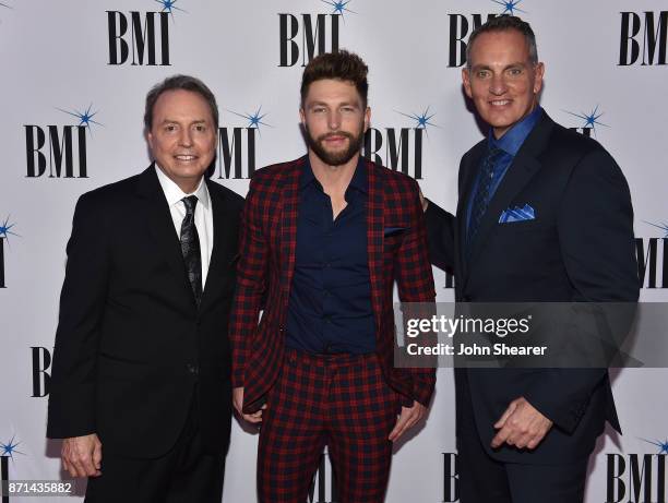 Vice President Creative, Nashville Jody Williams, singer-songwriter Chris Lane, and BMI President & CEO Mike O'Neill attend the 65th Annual BMI...