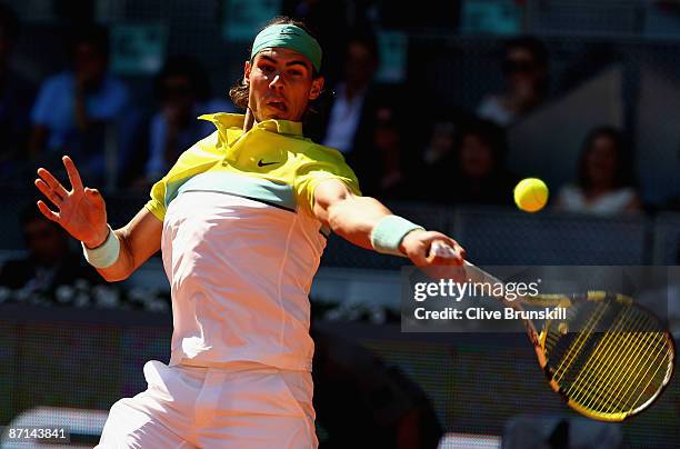 Rafael Nadal of Spain plays a forehand against Jurgen Melzer of Austria in their second round match during the Madrid Open tennis tournament at the...