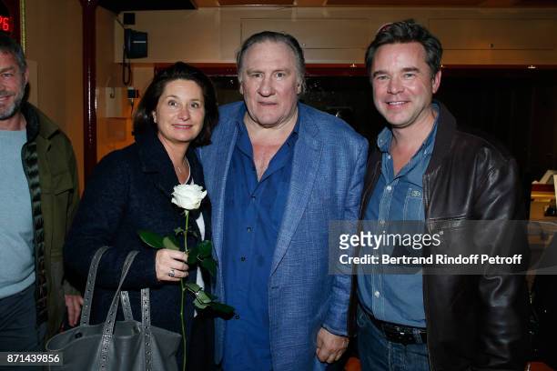 Gerard Depardieu standing between Guillaume de Tonquedec and his wife Christelle pose after "Depardieu Chante Barbara" at Le Cirque d'Hiver on...
