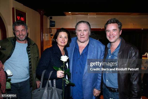 Of Courreges Jacques Bungert, Christelle de Tonquedec, Gerard Depardieu and Guillaume de Tonquedec pose after "Depardieu Chante Barbara" at Le Cirque...