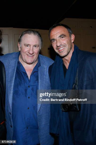 Gerard Depardieu and Nikos Aliagas pose after "Depardieu Chante Barbara" at Le Cirque d'Hiver on November 6, 2017 in Paris, France.