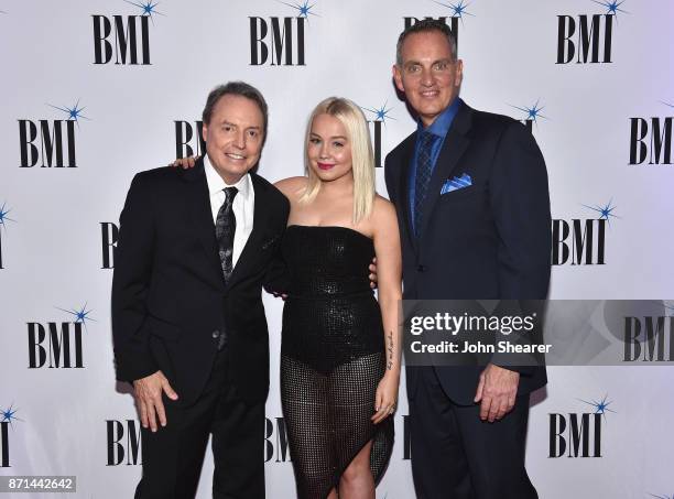 Vice President Creative, Nashville Jody Williams, singer-songwriter RaeLynn, and BMI President & CEO Mike O'Neill attend the 65th Annual BMI Country...